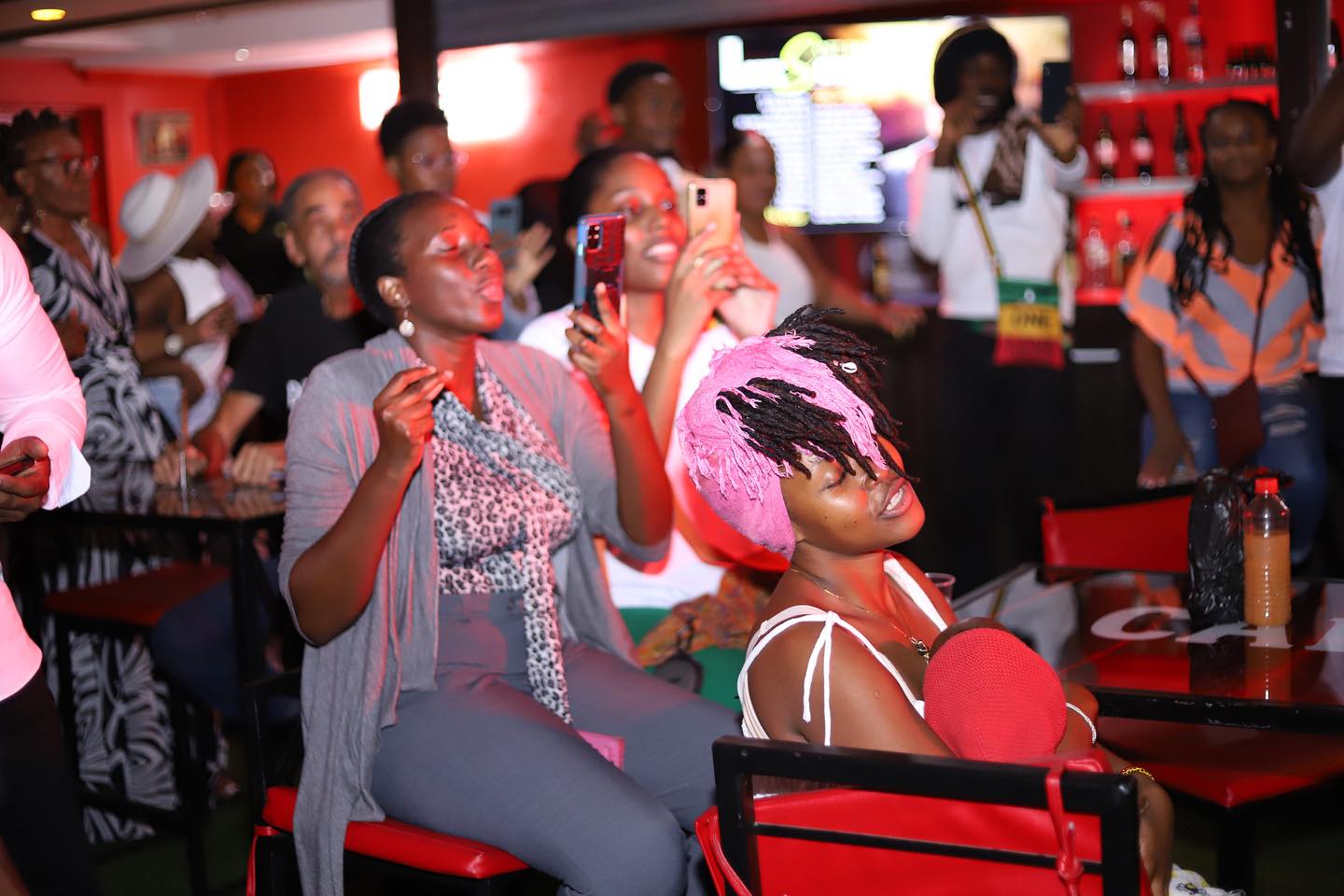 Vibrant crowd enjoying Footprints Cafe